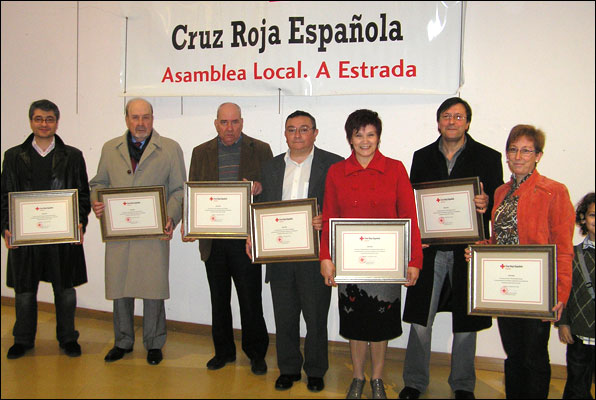Los homenajeados en la Asamblea Local de A Estrada.